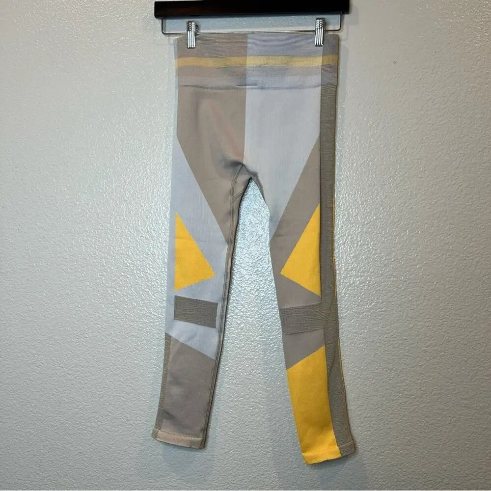 NIKE Sculpt LUX ICON CLASH Seamless 7/8 Training Knit Leggings yellow colorblock
